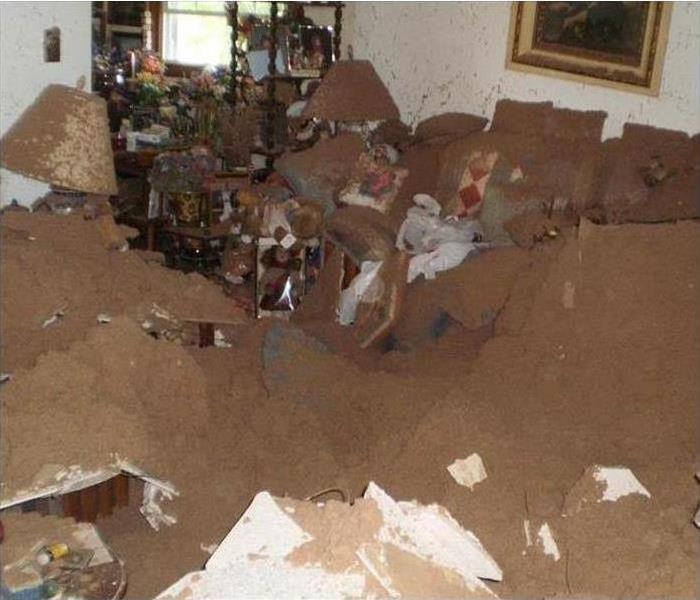 Ceiling collapsed in a living room of a house